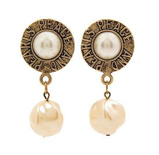 A Pair of Moschino "Peace and Pearls" Earclips, 2" x 1.25".