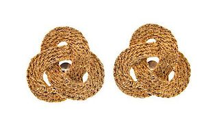 A Pair of Gold Textured Dress Clips,