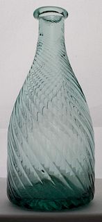 19th c pattern molded ribbed bottle, swirled to the left, aquamarine color, open pontil, ht 6”, dia 2.5”Dr Oliver Eastman col