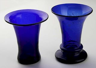 two 19th c free blown glass vases with flared lips, both with light open pontils, ht 4”, 4 1/4”, one with traces of hand pain