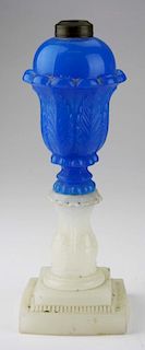 19th c pattern molded fluid lamp, opaque blue acanthus font & clambroth acanthus base, open pontil, ht 11.5”, Dr Oliver Eastm