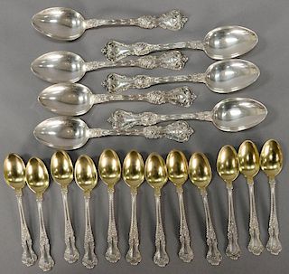 Sterling silver group to include twelve demitasse spoons with gold wash bowls along with a set of seven sterling silver spoons. 8.74...