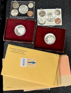 Coin lot including 1982 George Washington Commemorative 1/2 dollars 1961, 62, 63, & 64 proof sets and two 1960 uncirculated sets.