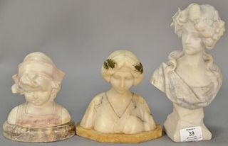 Three small alabaster busts, two of a woman and one of a young girl on marble base, two are signed. ht. 5 1/2" to 9"