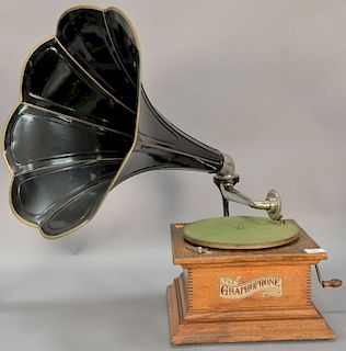 The Graphophone by Columbia, phonograph with oak case and tole horn. ht. 27"