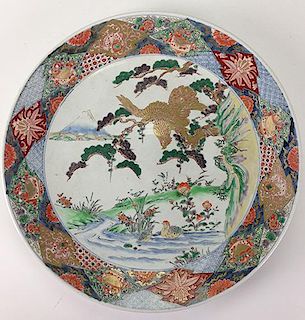 Japanese Meji period porcelain enamel decorated gilt charger with eagle and depiction of Mt. Fuji 16" dia.