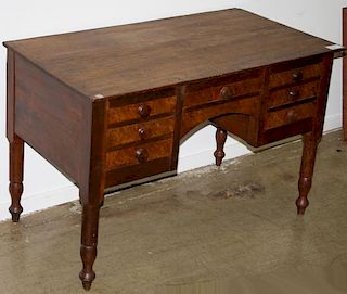 Vermont Sheraton kneehole desk, 7 drawers, birds eye maple, cherry and poplar, turned legs. Inscription on drawer. Miles June 28, 1888 Monkton, Vermon