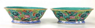 Pair of Chinese Qing Dynasty porcelain enamel low oval footed bowls with overall floral decoration, marked. 7.5" x 6" x 3"-each with rim chip