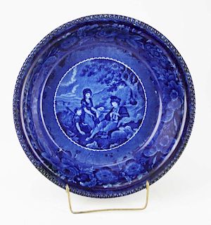 early 19th. C deep blue Staffordshire porcelain large bowl with transfer decorated scene of shepherd with sheep, mother, and child by E. & G. Phillips