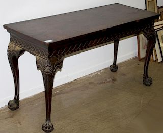 Great carved Chippendale hairy paw foot side table, walnut, mahogany and oak. 60"w x 32"h x 24"d. Late 19th c on early 20th.