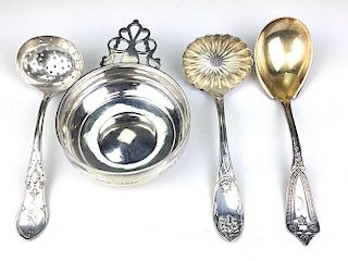four pieces assorted silver incl. sterling serving spoon, sterling porringer, coin silver ladle by  A.C. Benedict,  coin silver slotted ladle by R. Fe