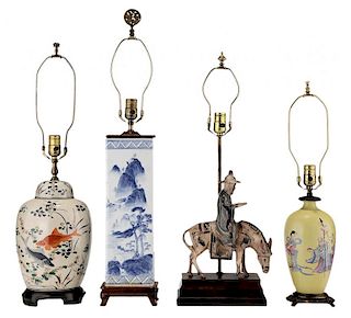 Four Ceramic Table Lamps 粉彩鱼草纹、青花山水纹、粉彩人物纹、骑驴人物造像灯座各一，最高的高24.5英寸，19/20世纪,