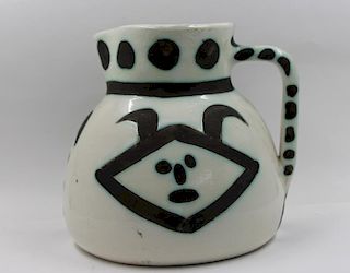 PICASSO, Pablo. 1956 Signed Turned Pitcher "Heads"