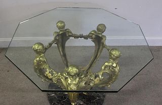 Bronze and Glass Top Figural Coffee Table.