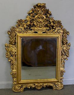 Large Highly Carved  Antique Continental Mirror.