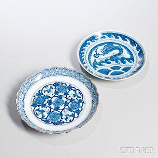 Two Blue and White Porcelain Dishes 鱼龙戏珠海水纹和团花人物纹青花碟两只，高1.5英寸，直径7.875英寸，康熙民窑，中国