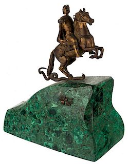 A LARGE GILT BRONZE STATUE OF PETER THE GREAT AS THE HORSEMAN ON A MALACHITE BASE
