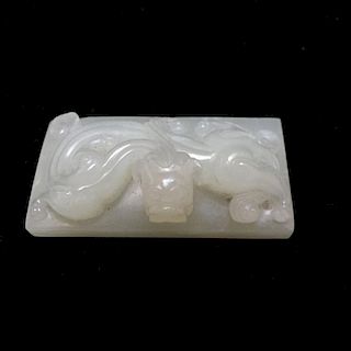 AN ANTIQUE WHITE JADE CHILONG SEAL