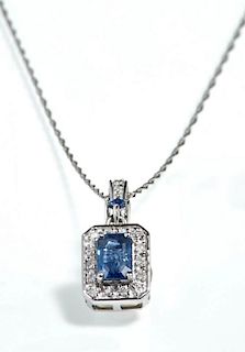 14K White Gold Pendant, with an emerald cut .5 car