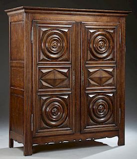French Louis XIII Style Carved Oak Armoire, 20th c
