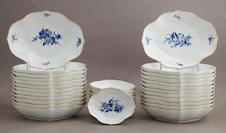 Group of Thirty-Three Shallow Meissen Porcelain Bowls, 20th c., of lobed oval form, with gilt, blue floral and bug decoration, consisting of 23 large 