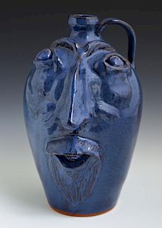 Jack T. Maness, "Face Jug," 20th c., two pieces of