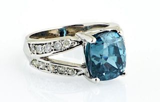 Lady's 14K White Gold Dinner Ring, with a blue 7.0