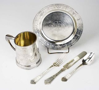 Whiting sterling child's service including plate, mug, fork, knife, and spoon. Spectacularly ornate Aesthetic motif. Each piece monogrammed FAB. Mug i
