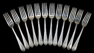 Rogers, Lunt & Bowlen Treasure sterling silver forks in "" pattern. 18.1 troy oz. 12 pcs.