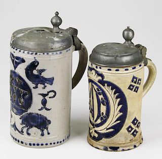 two late 18th c- early 19th c German Westerwald stoneware tankards/ steins with scratched in designs, ht 8ﾔ, 7ﾔ, damage, repairs to both pewter li