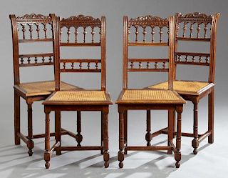 Set of Four French Henri II Style Carved Oak Dinin