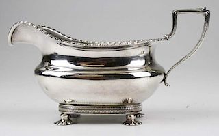 Georgian style sterling silver footed sauce boat with gadrooned rim retailed by A. Feldenheimer Portland, Or. 3.5" x 7" x 4