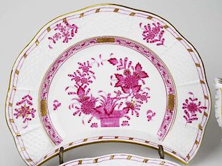 group of raspberry Herend porcelain incl. Chinese Bouquet covered vegetable and chocolate pot, Indian Basket side plates and
