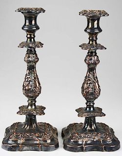 pair of old Sheffield silver plate candlesticks with deep floral repousse decoration 13" x 5.5"