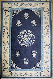 mid 20th c Chinese area rug, 2' 11” x 4' 8”