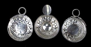 three 19th c. European silver wine tasters inset with old coins, two with twisted snake handles 4" x 3"