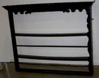 Early English hanging plate rack, oak and soft wood, scalloped. 53"w x 41"h.