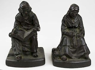 pr of 1920's copper jacketed bookends, seated couple, ht 7.5”