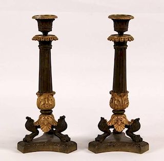 PAIR OF FRENCH DORE AND BRONZE REGENCY CANDLESTICKS