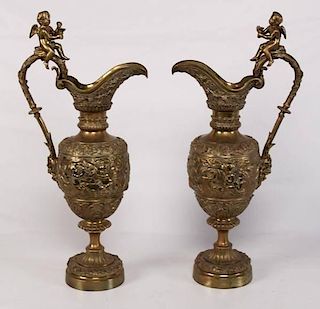 PAIR OF FRENCH BRONZE EMBOSSED EWERS