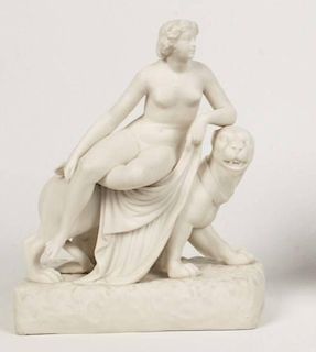 PARIAN WARE FIGURE OF RECLINING NUDE ON PANTHER