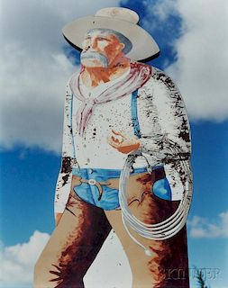 Jim Dow (American, b. 1942)      Cowboy Sign on the Enchanted Highway near Mandan, North Dakota