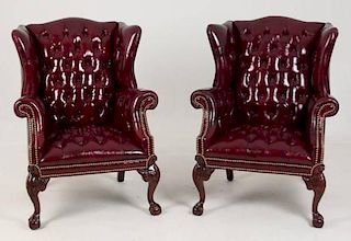 PAIR OF TUFTED LEATHER MAHOGANY WING CHAIRS