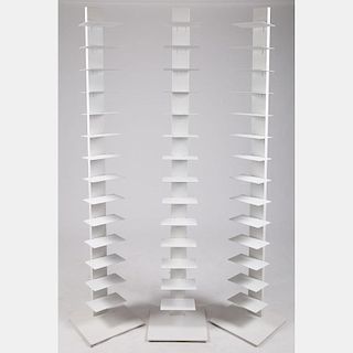 A Group of Three White Metal Sapien Bookcases, 20th Century.