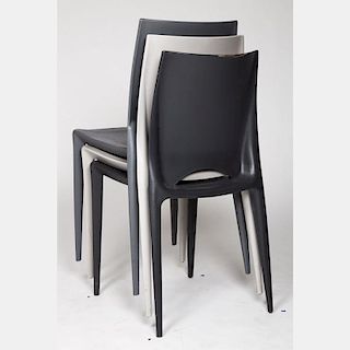 A Set of Three Reproduction Stacking Chairs after Mario Bellini, 20th Century.