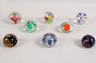 GROUP OF 8 HAND BLOWN FLORAL PAPERWEIGHTS