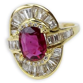 Oval Cut Ruby, Baguette, Square and Single Cut Diamond and 14 Karat Yellow Gold Ring.