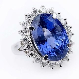 GIA and AIG Certified 8.30 Carat Oval Brilliant Cut Natural Unheated Sapphire, .67 Carat Round Brilliant Cut Diamonds and Platinum Ring.