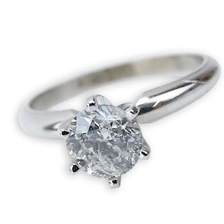 AIG Certified 1.00 Carat Round Brilliant Cut Diamond and 14 Karat White Gold Engagement Ring.