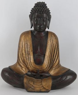 Carved and Gilt Decorated Seated Buddha.